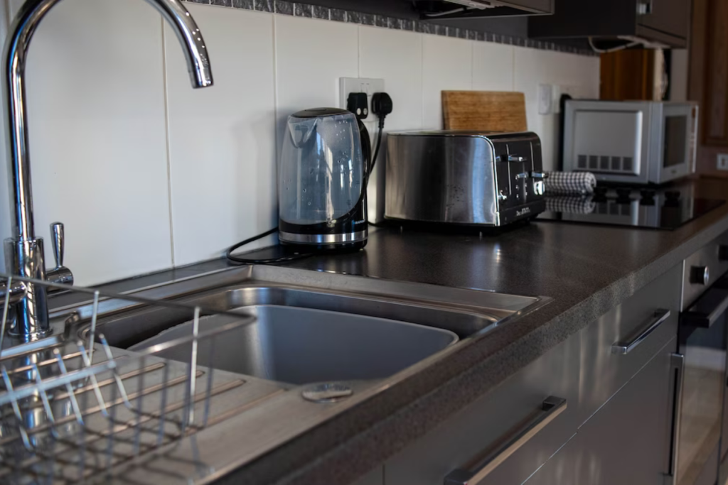 10 sink with kettle and toaster